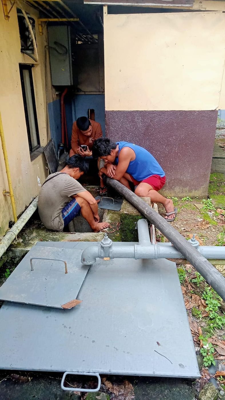 Malabanan team performing a plumbing job